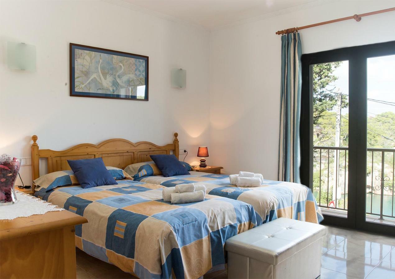 Apartamentos Vista Al Puerto Кала Фигуера Экстерьер фото
